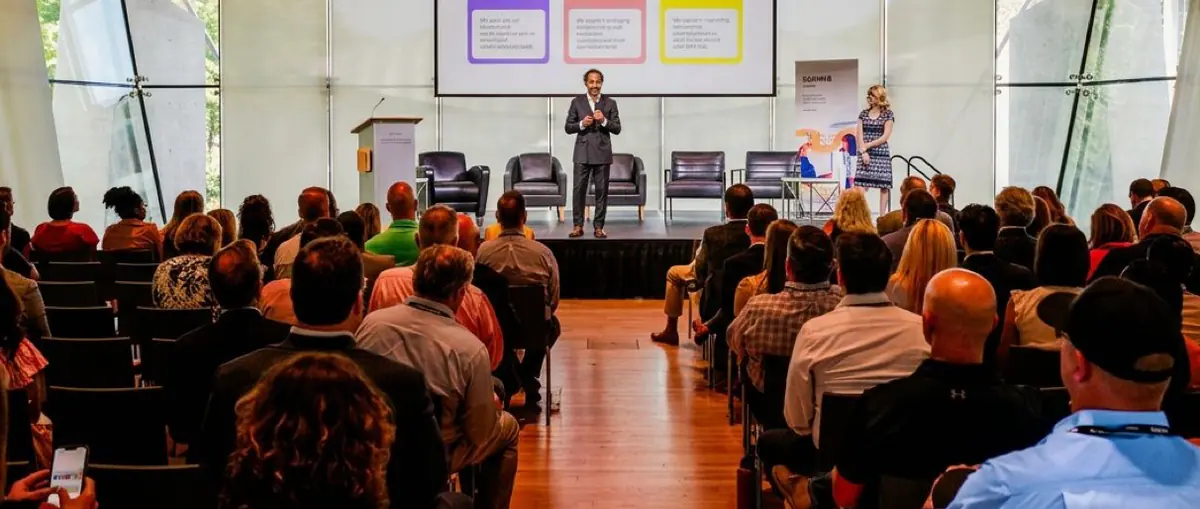 Speaker leading a training for an audience
